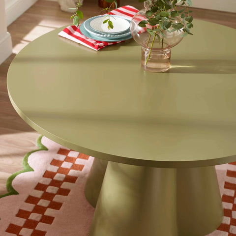 Felix 120cm Sage Green Round Dining Table with a sculptural pedestal base, statement design.