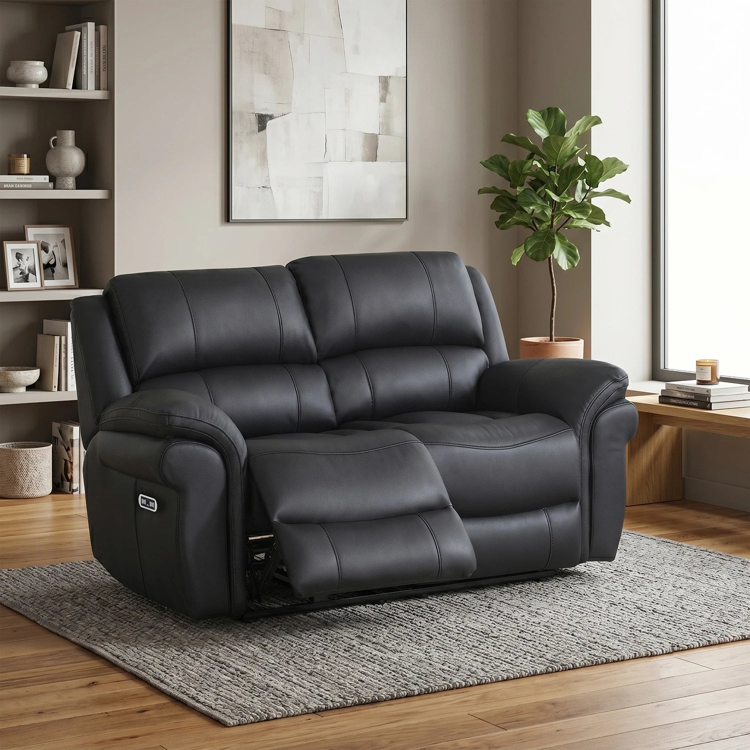 Flynn Black power recliner 2 seater sofa with premium leather-look fabric, electric reclining seats, USB charging and pocket sprung comfort.