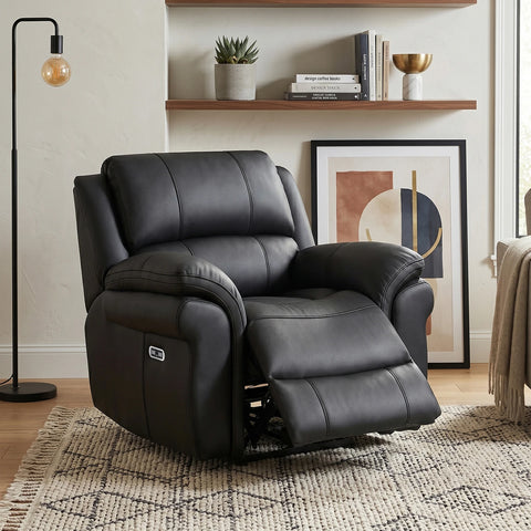 Flynn Black power recliner armchair with premium leather-look fabric, pocket sprung seat, USB charging and smooth electric reclining comfort.
