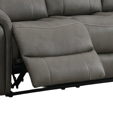 Close-up of a Flynn power recliner 3 seater sofa in  Stone Premium leather-look fabric, electric reclining showing the extended footrest and stitching details.