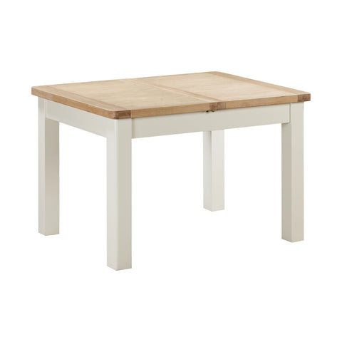 A Foxington Dining Table with a light natural wood top and off- white painted frame and legs, shown on a plain white background.