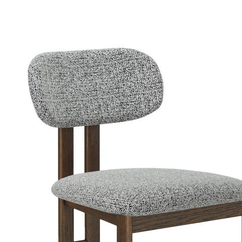 Close-up of textured grey upholstery on dining chair