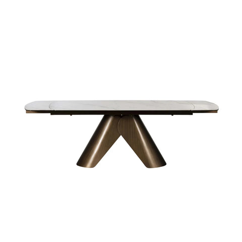 Varenna White Ceramic Extending Dining Table, 180-240cm. Featuring a marble-effect ceramic top, sculptural bronze base and seating for up to 10.