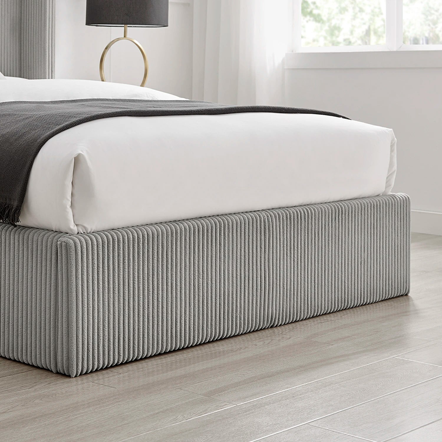 Close up of the footend on the Gemora Luxury Ottoman Storage Bed in grey 