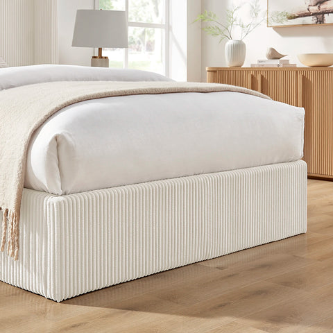 Close up of the Gemora Luxury Storage Bed Natural corded fabric footend 