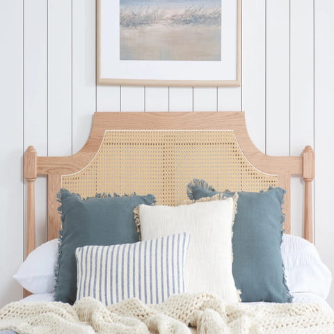 French style bed with detailed rattan panels and refined finish.