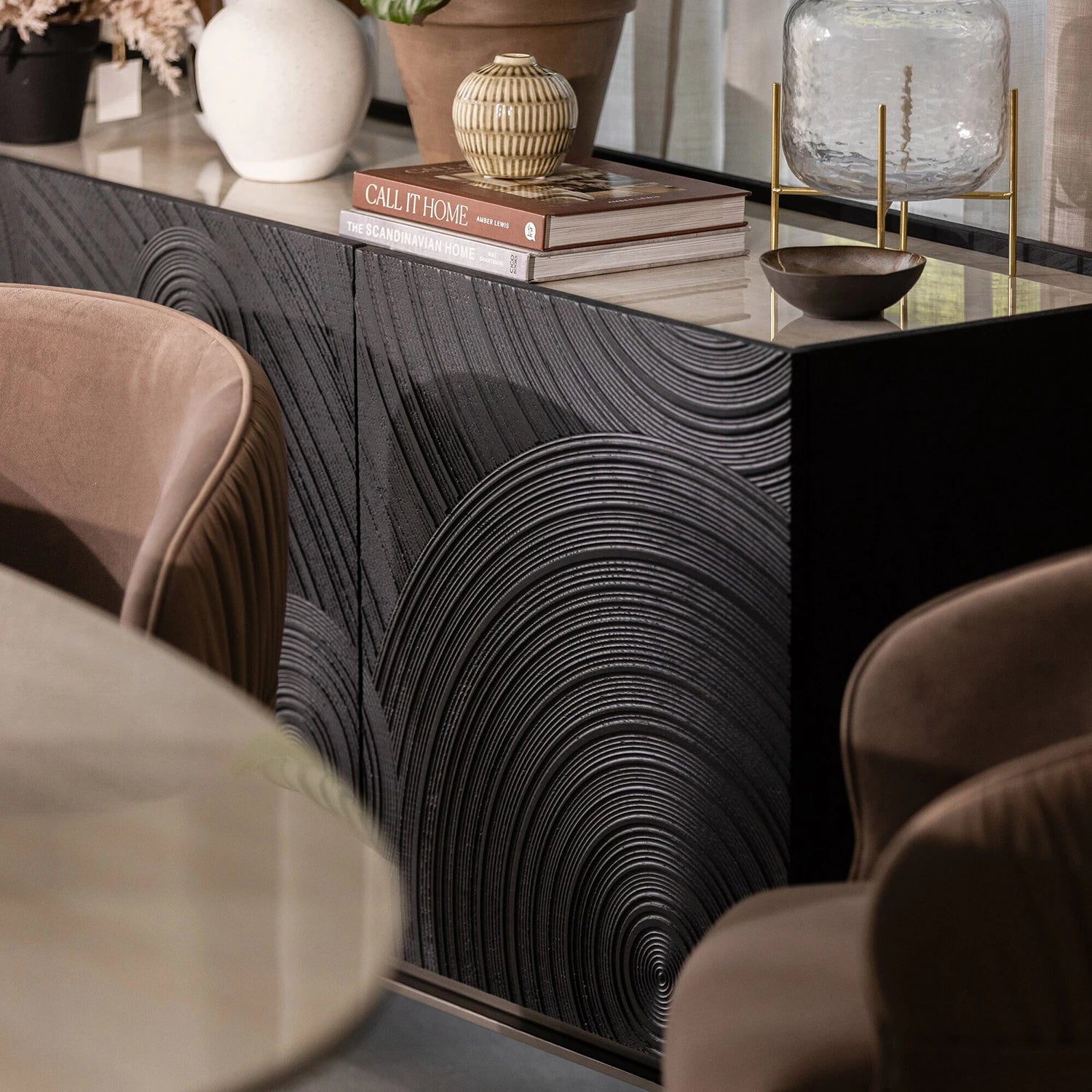 Brann ceramic top textured sideboard with black circular groove doors
