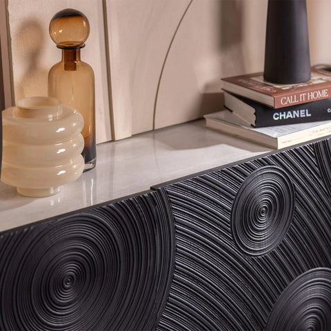 Modern black sideboard with light grey ceramic top and bronze legs