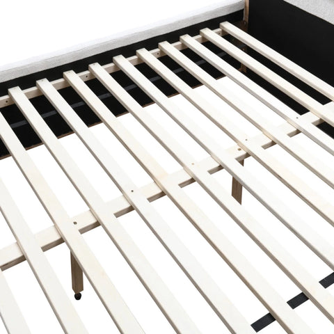 Durable upholstered bed frame with strong internal support structure.