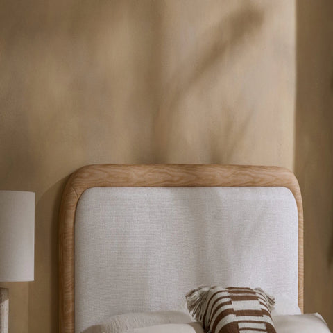 Rounded headboard designed for comfort and modern style.