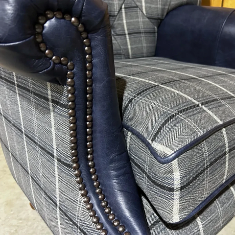 Oswald and Pablo Round Vintage Wing Chair with Brown legs