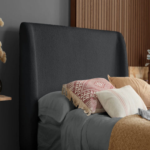 Textured fabric headboard offering comfort and contemporary style.