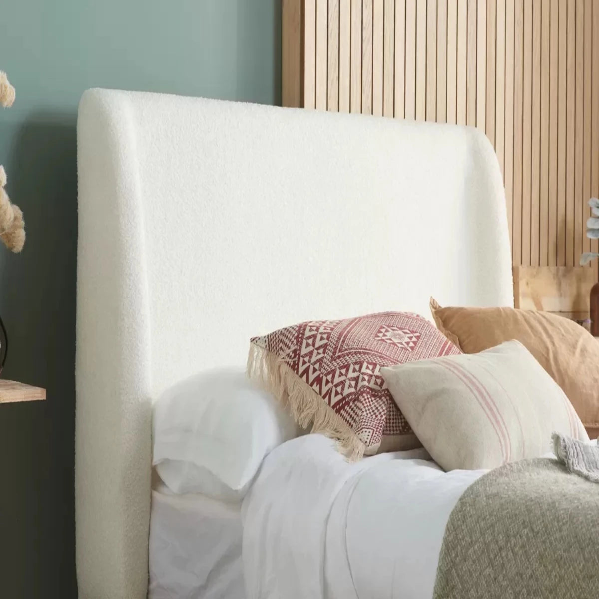 textured fabric headboard offering comfort and contemporary style.