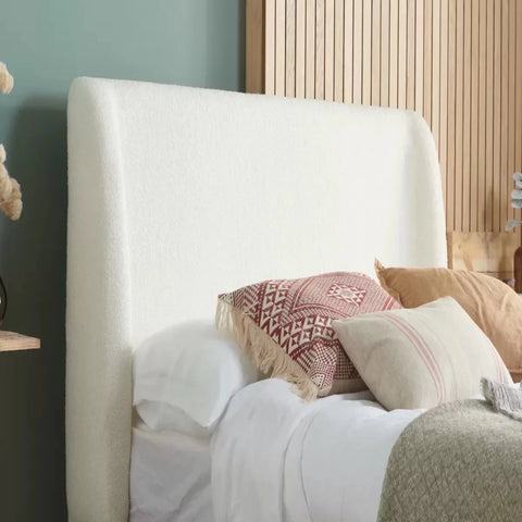 textured fabric headboard offering comfort and contemporary style.