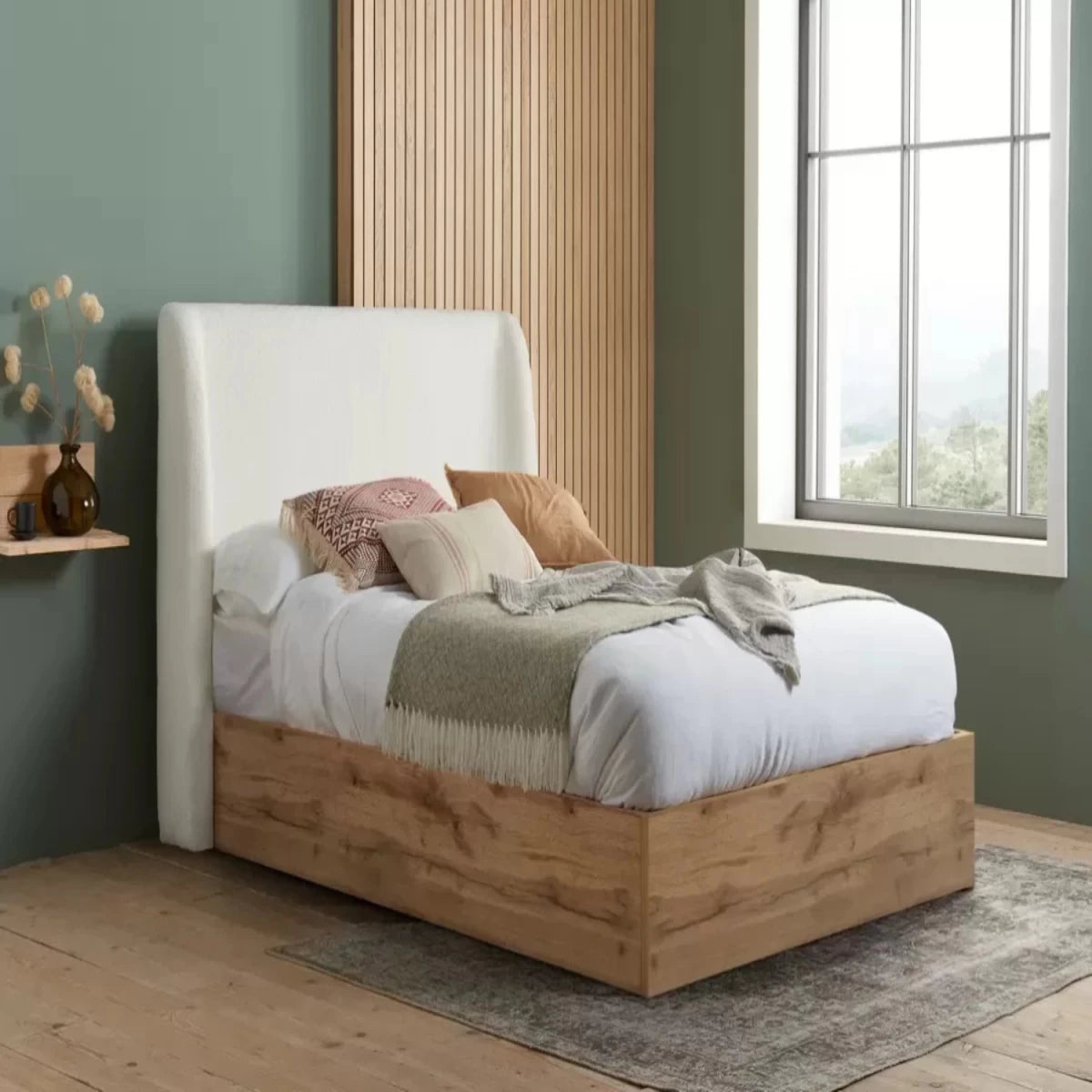 Modern bed with soft bouclé fabric adding warmth and depth.