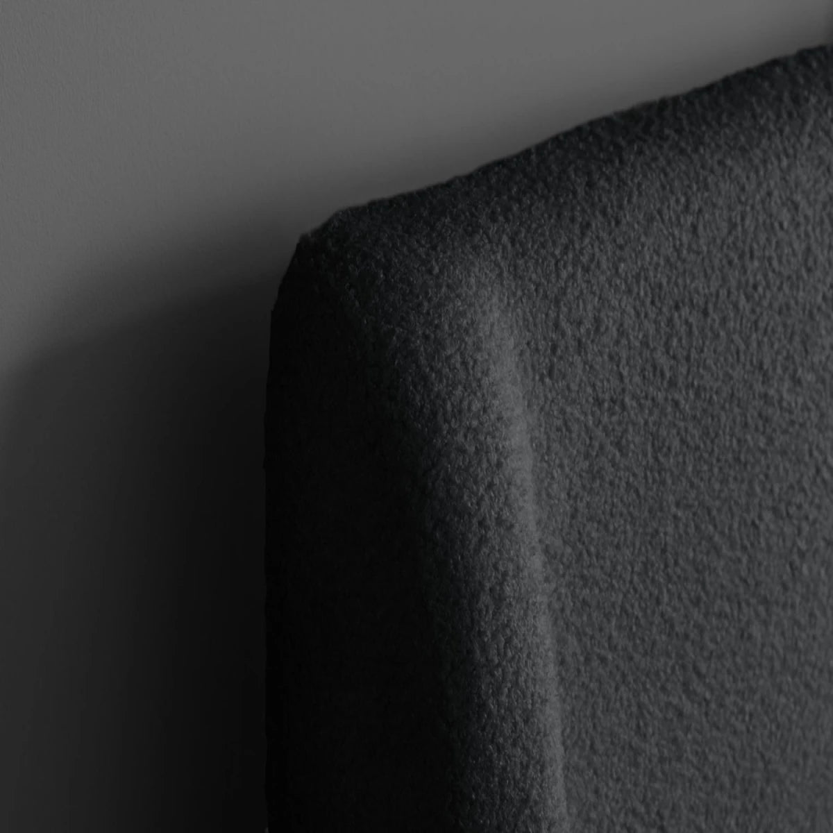 Minimalist upholstered headboard with smooth lines and cozy finish.
