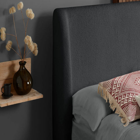 Upholstered bouclé headboard with soft padding and clean modern design.