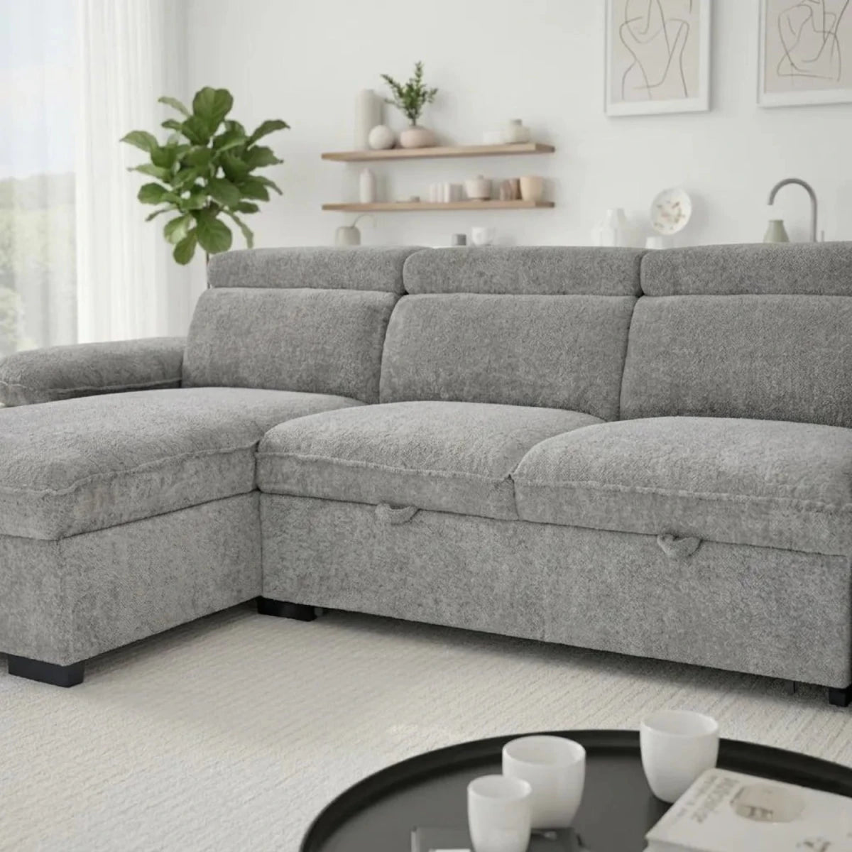 Modern L-shaped grey sofabed with textured upholstery.