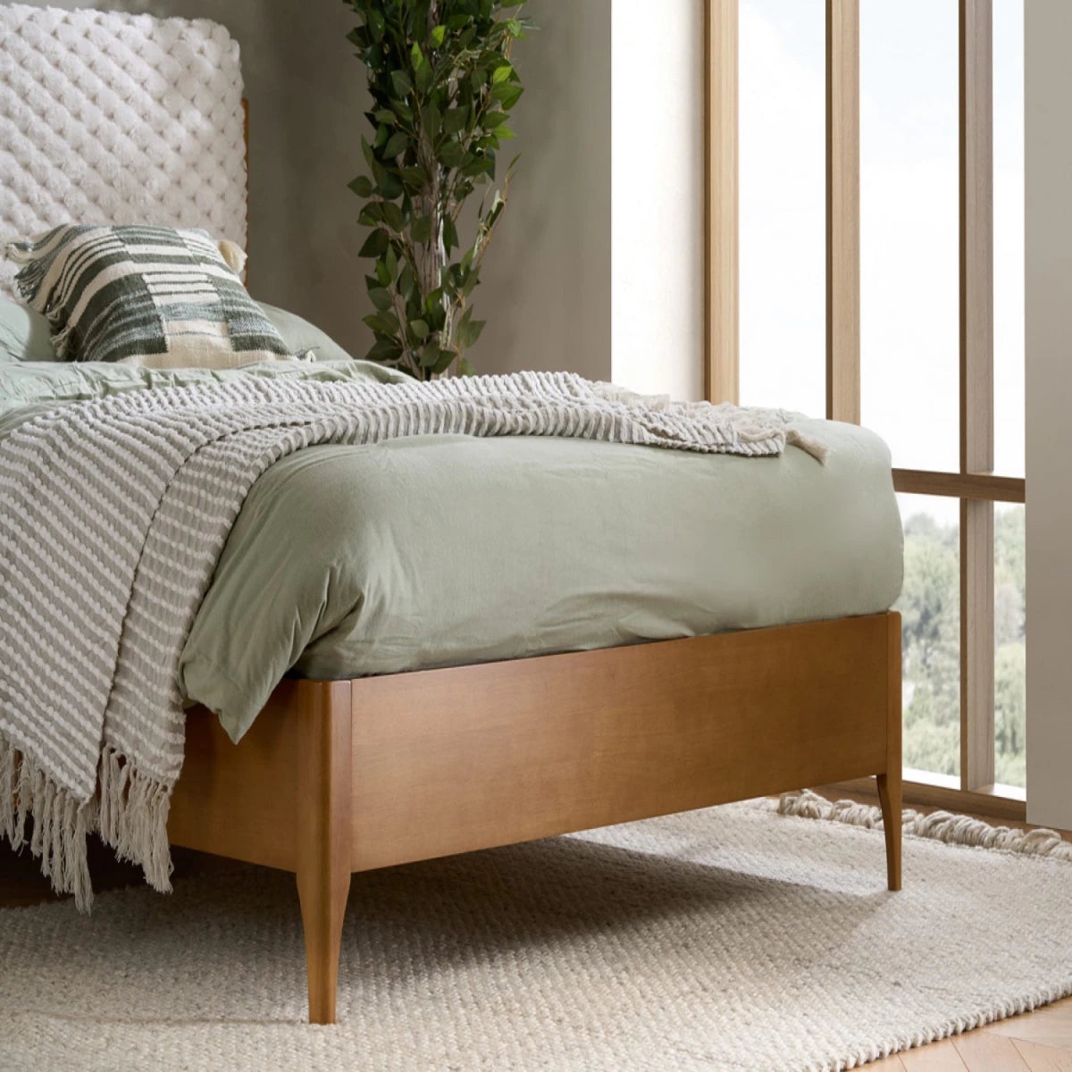 Durable wood feet providing stability and balanced structure.