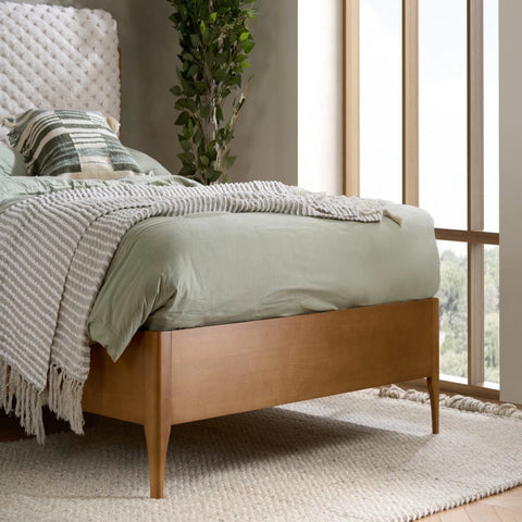 Durable wood feet providing stability and balanced structure.