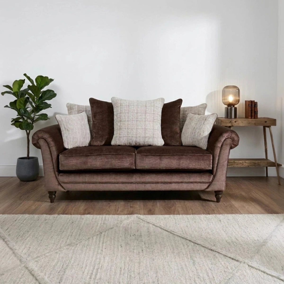 Classic fabric sofa with pillow back cushions, deep comfortable seating, and timeless design.