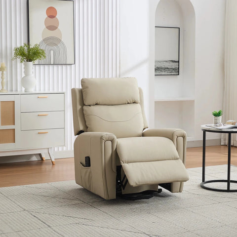 A beige leather riser  recliner chair with the footrest extended, set in a modern, bright living room with a white sideboard, framed art, and a small round side table.