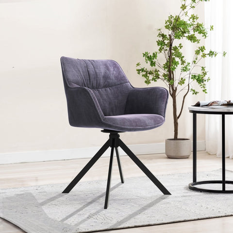 Set of 4 Comic Graphite velvet dining chairs with black metal legs. Comfortable, lightweight, and stylish seating that elevates any modern dining space.