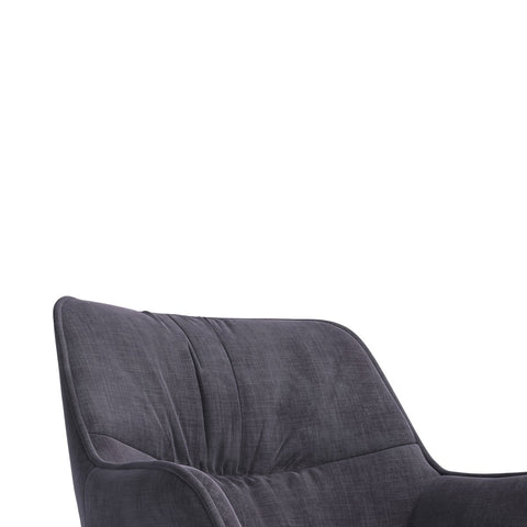 Close-up of graphite velvet upholstery and matte black legs