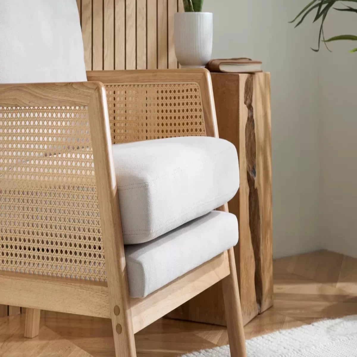 Stylish single chair with natural woven detailing.