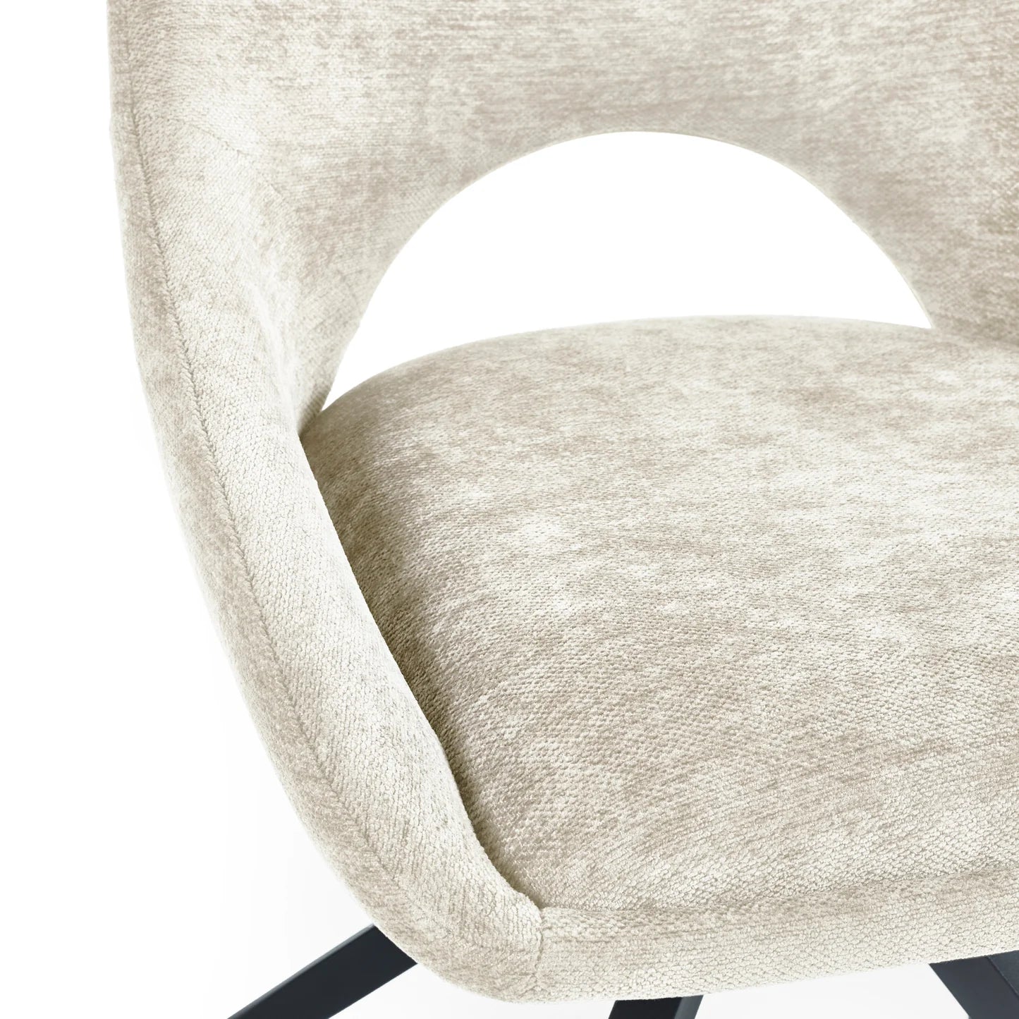 Close-up of a beige upholstered chair with a white background