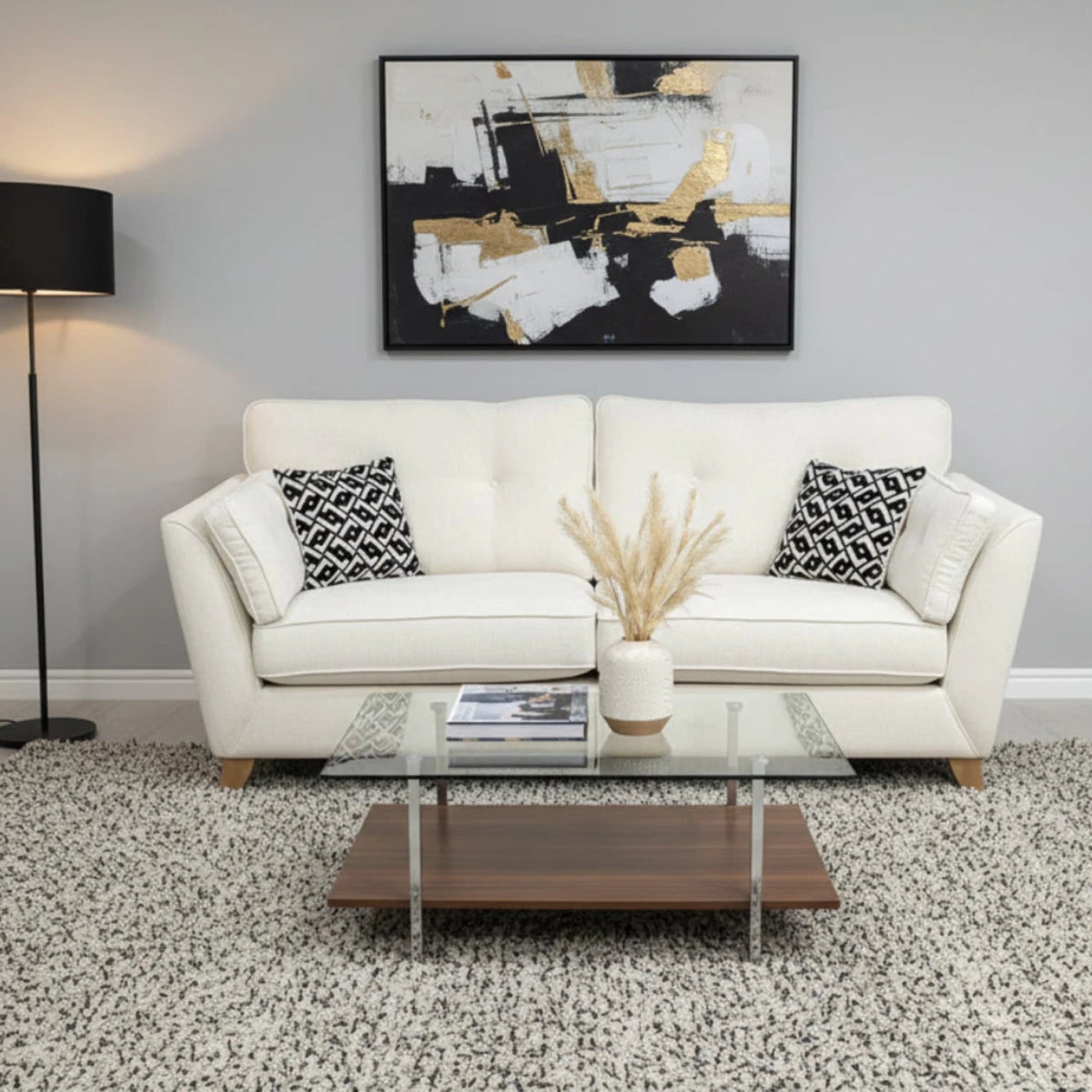 Joshua Matera 2 seater fabric sofa with soft upholstery and wooden legs.