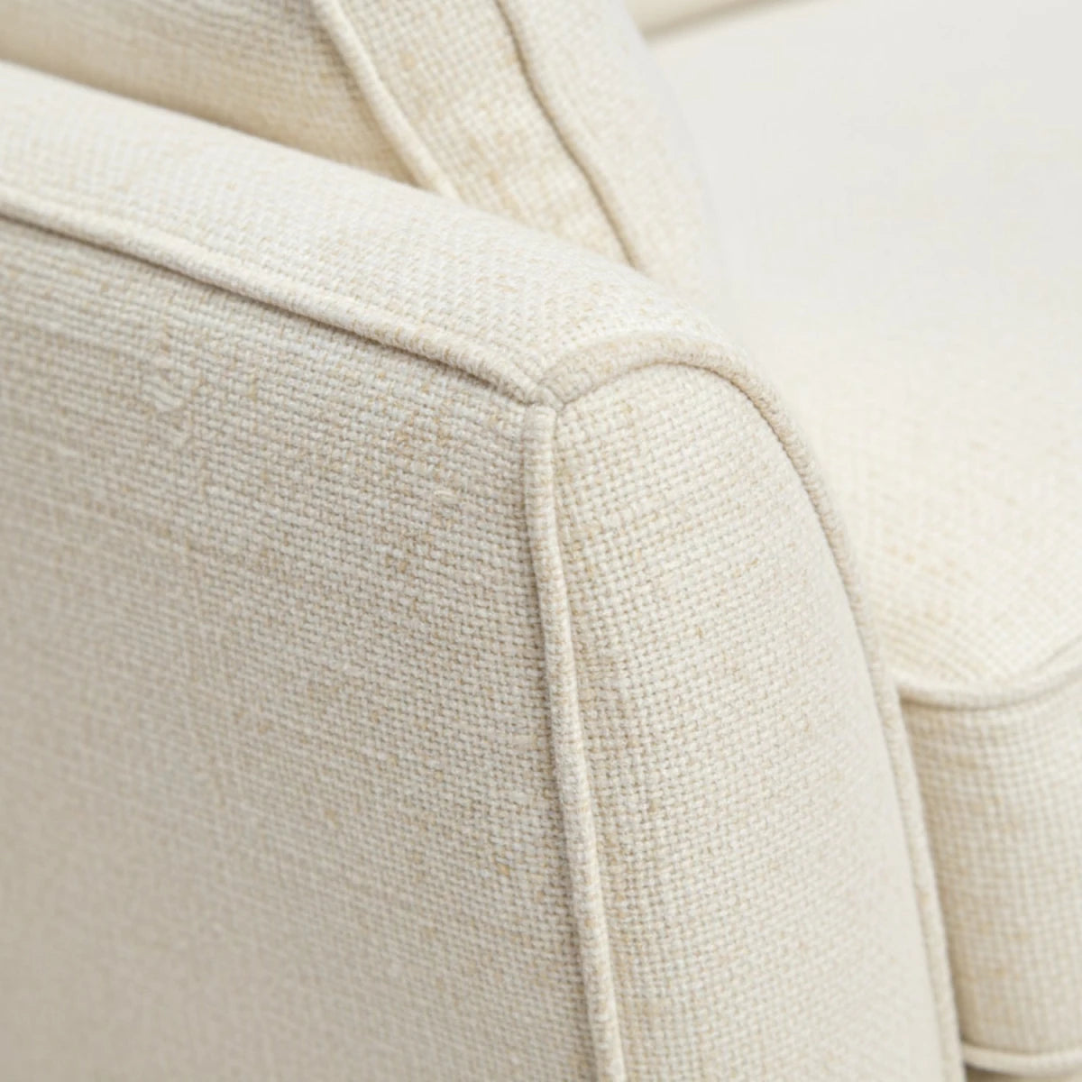 Neutral tone fabric upholstery designed for comfort and style.