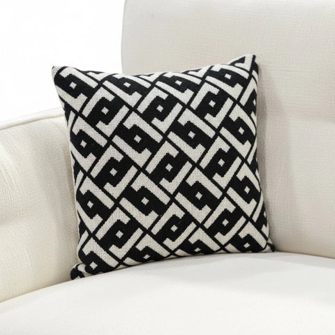 Soft decorative cushions adding depth and contrast.