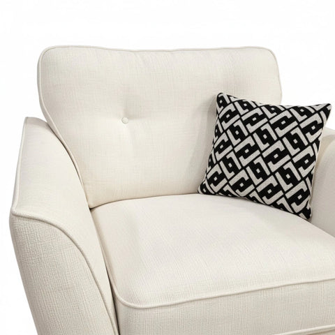 "Plush back cushions with premium fabric and deep comfort.