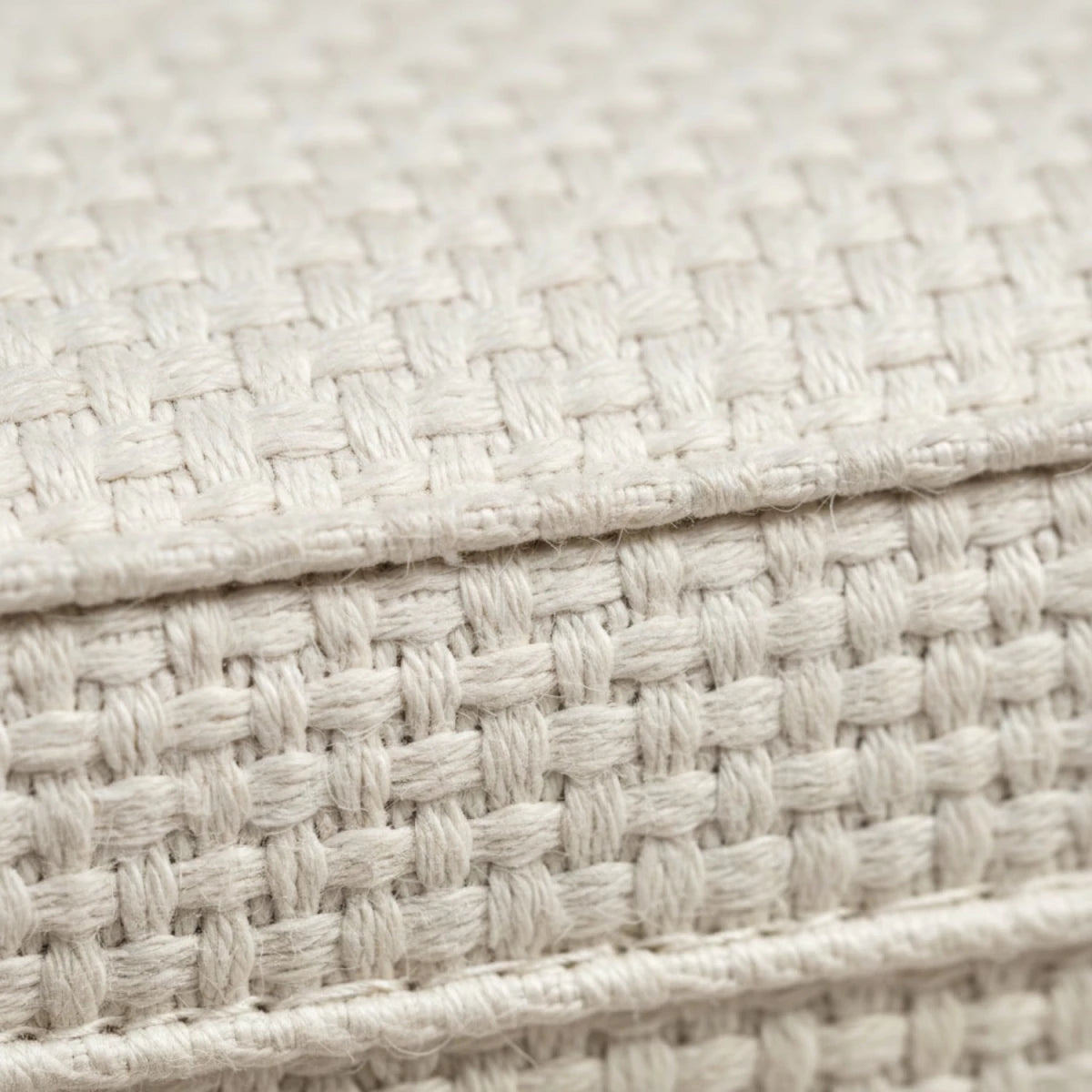 Neutral tone fabric upholstery designed for comfort and style.