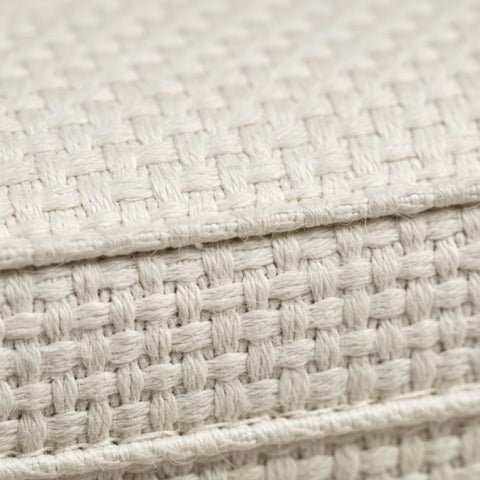 Neutral tone fabric upholstery designed for comfort and style.