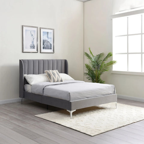 Athena Grey Velvet Bed with stitched headboard and brass silver legs. Available in King and Super King. Modern, elegant, and built for long-lasting comfort.