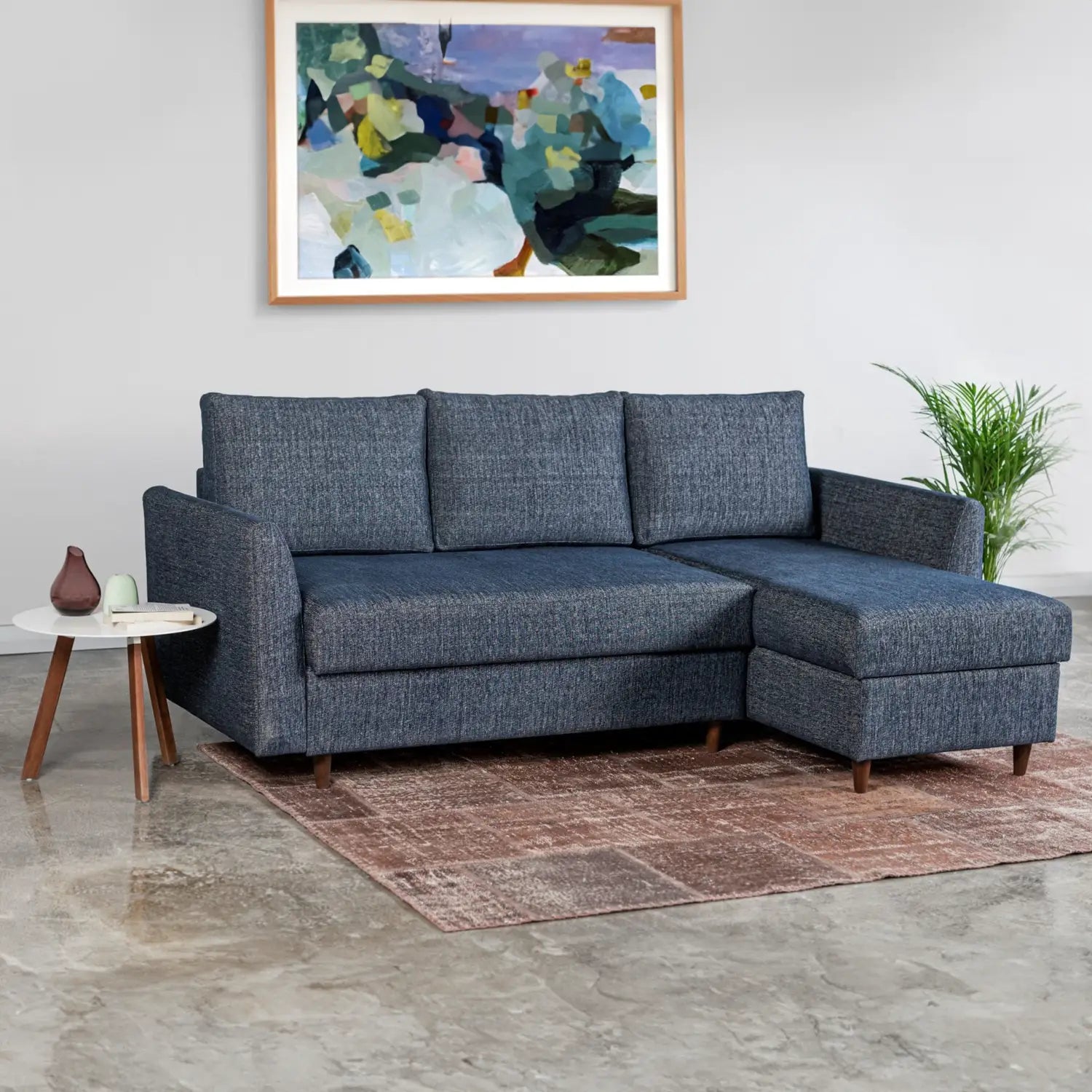 Metis Corner Sofa Bed upholstered in sophisticated Navy Blue Textured Weave Fabric – a modern and stylish choice for any living space - Lifestyle Image