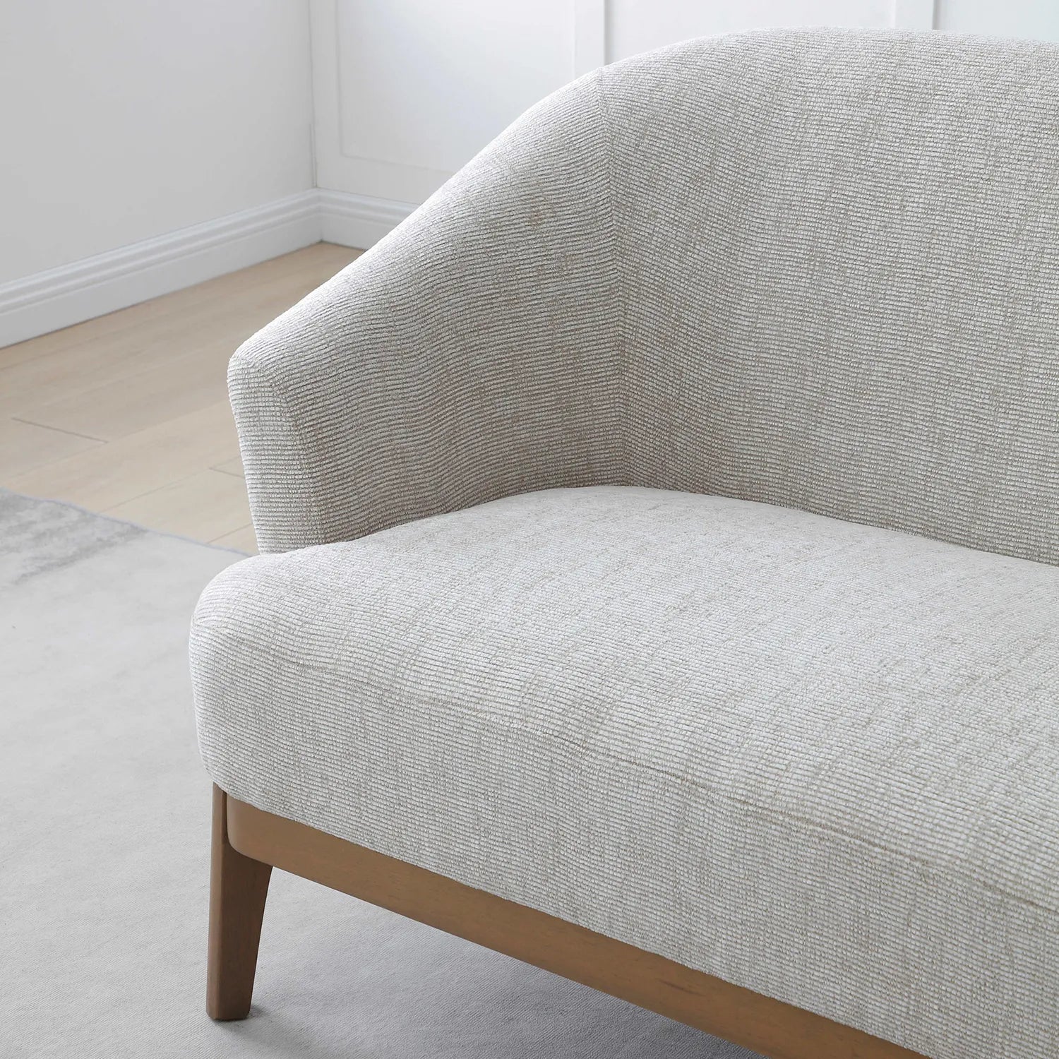 Close up Arm View of Leto Natural Woven Chenille 2 Seater Chair with Brown Wooden Frame Legs