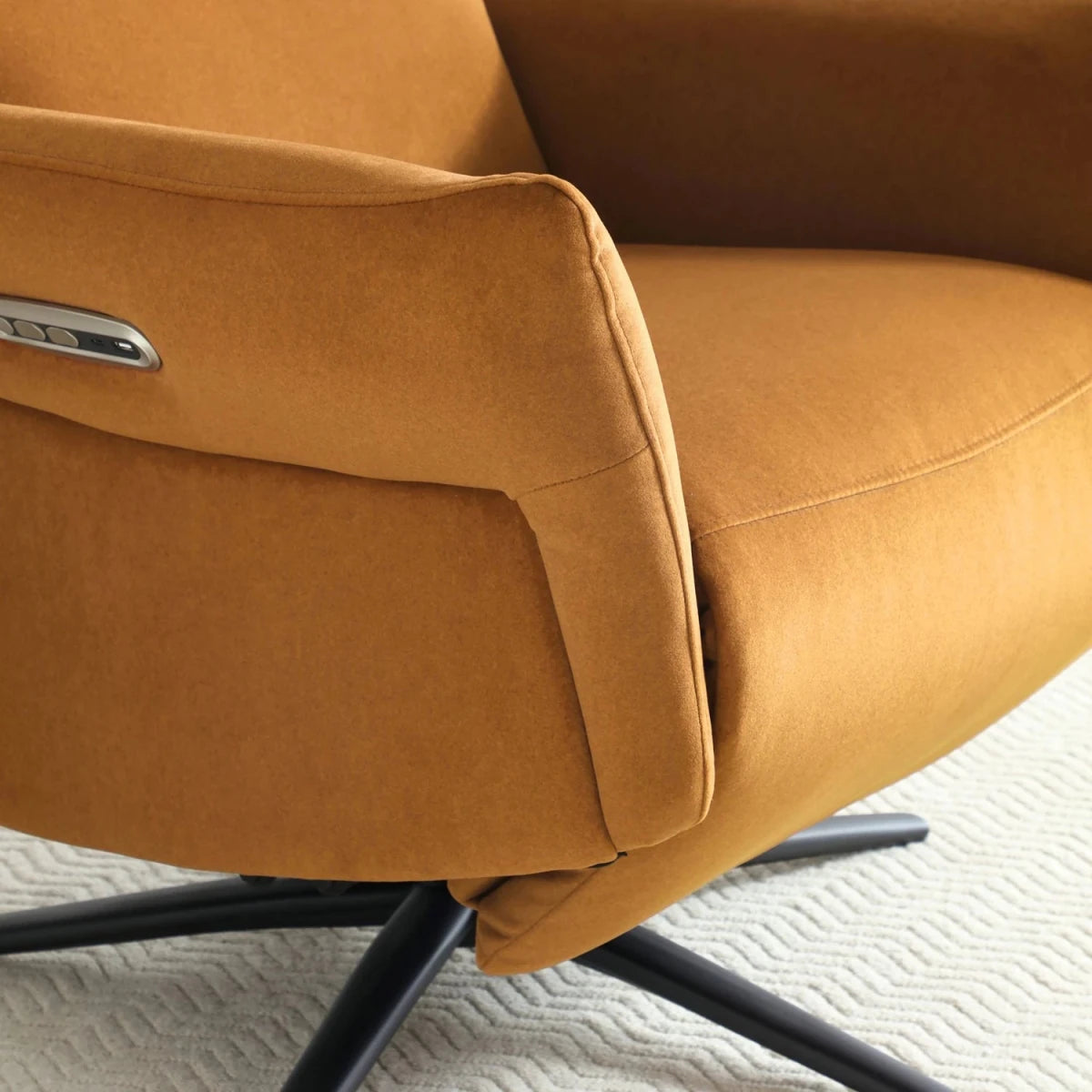 Close up Electric recliner chair in ochre fabric upholstery