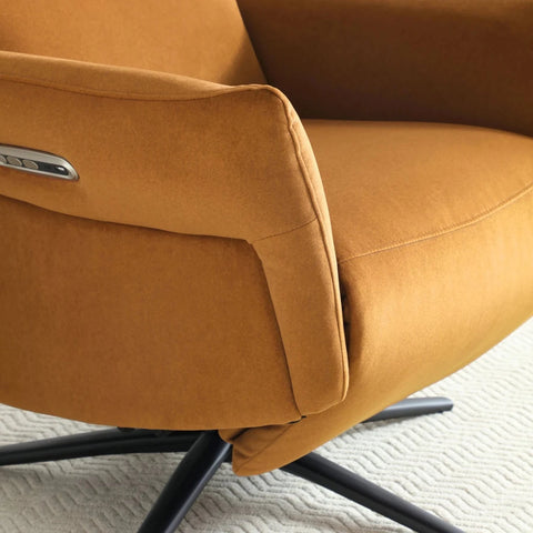 Close up Electric recliner chair in ochre fabric upholstery