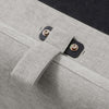 Close-up of a gray fabric handle of Usher Grey Chenille Ottoman Storage Bed with Curved Headboard