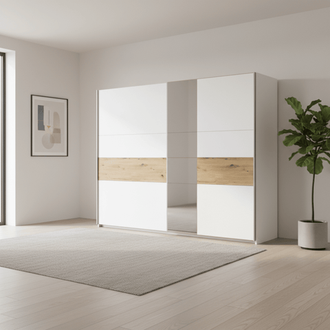 Modern sliding wardrobe with white and wood panel design in a minimalistic room.