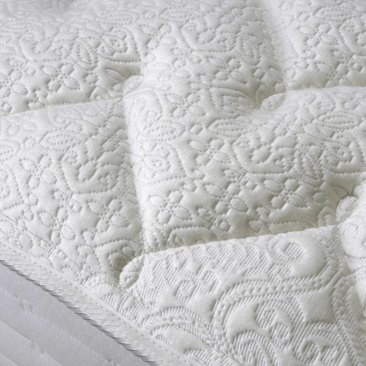 Mattress with dual spring system and knit cover