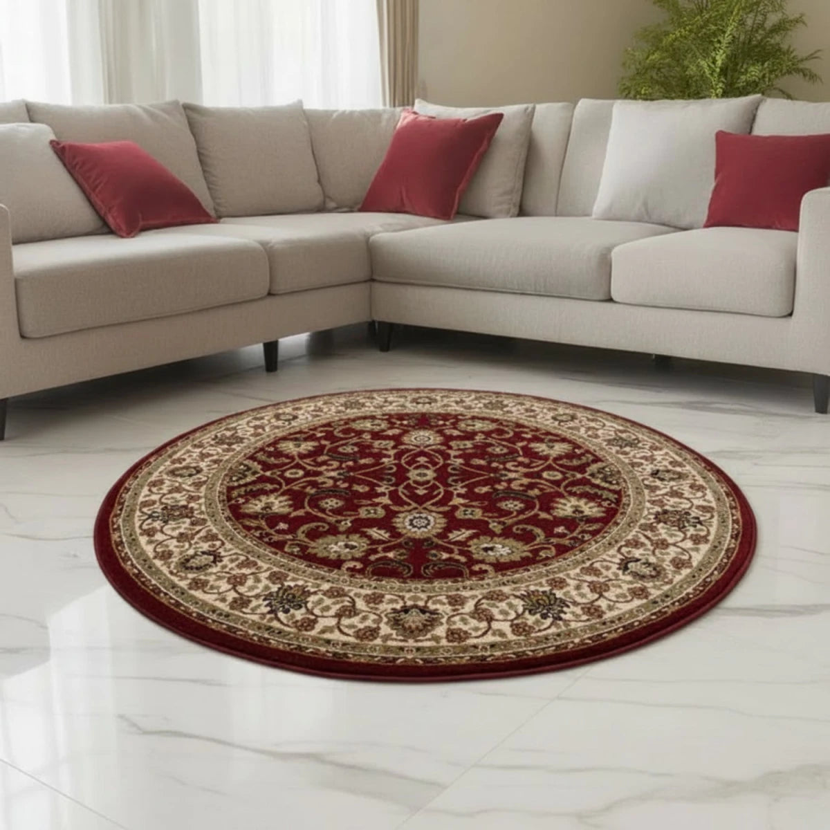 Decorative round rug with traditional floral detailing.