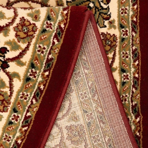 Decorative rug with traditional floral detailing.