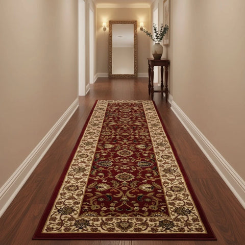 Elegant runner design with detailed floral motifs in red tones.