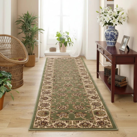 Keshan green runner with intricate traditional Persian pattern.