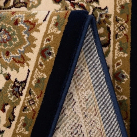 Traditional round rug in deep navy tones.
