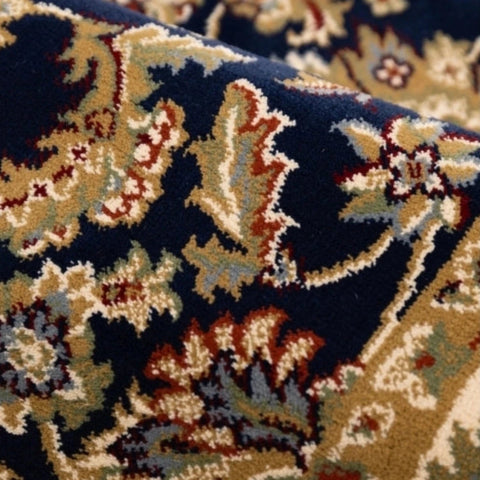 Soft navy round rug for living spaces.